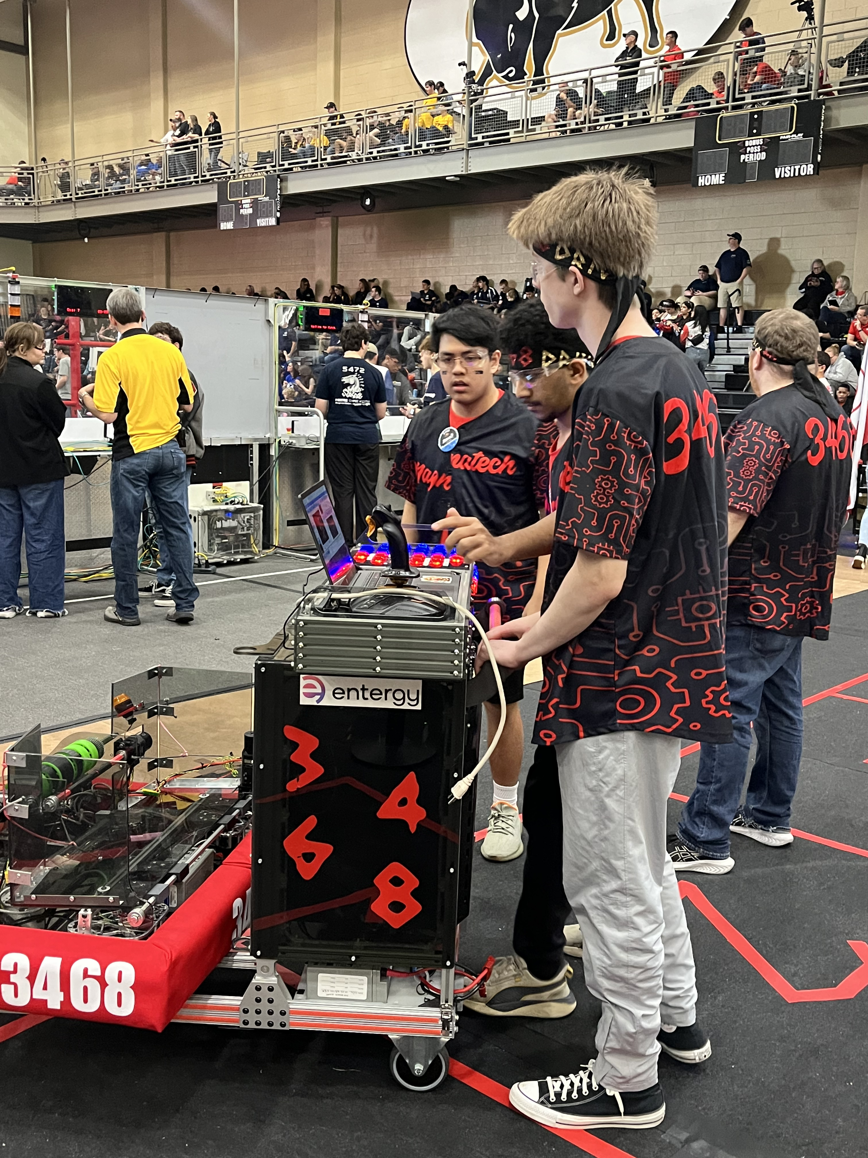 MAGNAtech students queueing for a match